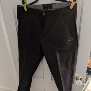 Oakley black golf pants.